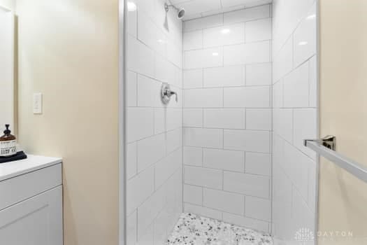 1108 Donson Dr, Kettering, OH 45429 - full bath featuring tiled shower and vanity