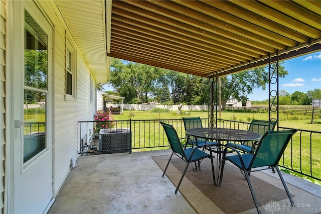 6726 Middletown Germantown Rd, Middletown, OH 45042 - view of patio featuring outdoor dining area and cooling unit