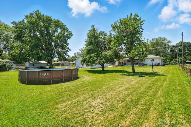 6726 Middletown Germantown Rd, Middletown, OH 45042 - view of grassy yard with an outdoor pool
