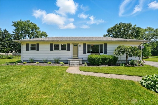 6726 Middletown Germantown Rd, Middletown, OH 45042 - ranch-style home featuring a front yard, concrete driveway, and an attached garage