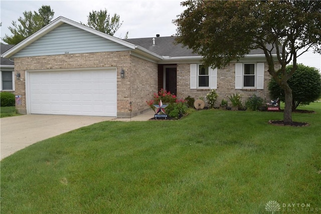 804 Spring Lake Cir, Enon Vlg, OH 45323 - ranch-style house with driveway, a front yard, an attached garage, brick siding, and roof with shingles