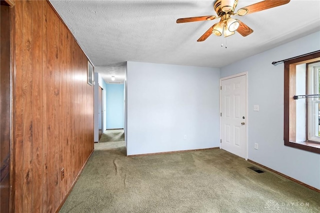 1385 Kylemore Dr, Xenia, OH 45385 - carpeted spare room with ceiling fan and baseboards