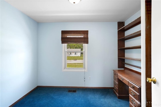 1385 Kylemore Dr, Xenia, OH 45385 - empty room featuring dark colored carpet and baseboards