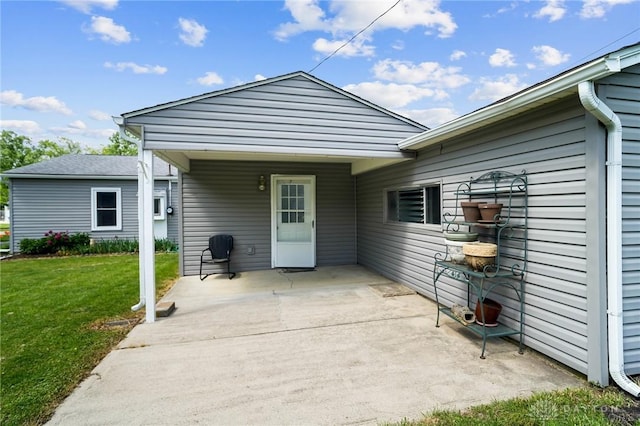 1385 Kylemore Dr, Xenia, OH 45385 - rear view of house with a lawn and a patio