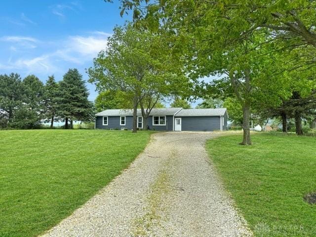 1277 Yocom Rd, Cable, OH 43009 - view of front of home featuring driveway and a front lawn