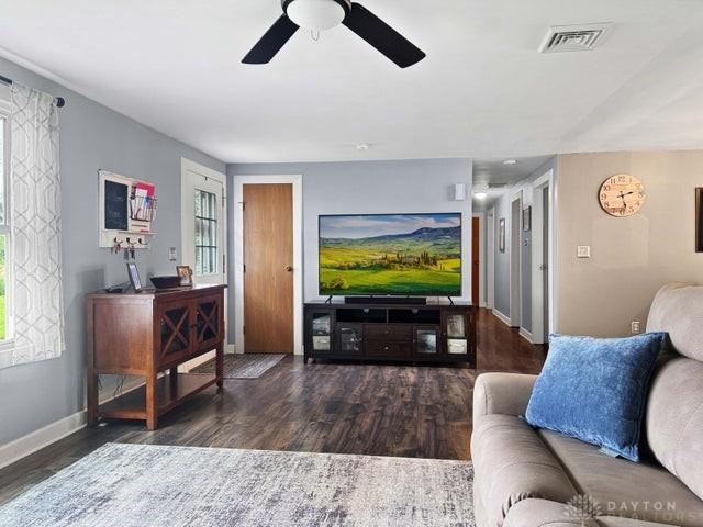 1277 Yocom Rd, Cable, OH 43009 - living room featuring wood finished floors, baseboards, and ceiling fan