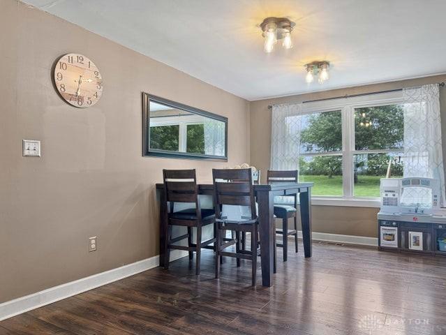 1277 Yocom Rd, Cable, OH 43009 - dining space with baseboards and dark wood-type flooring