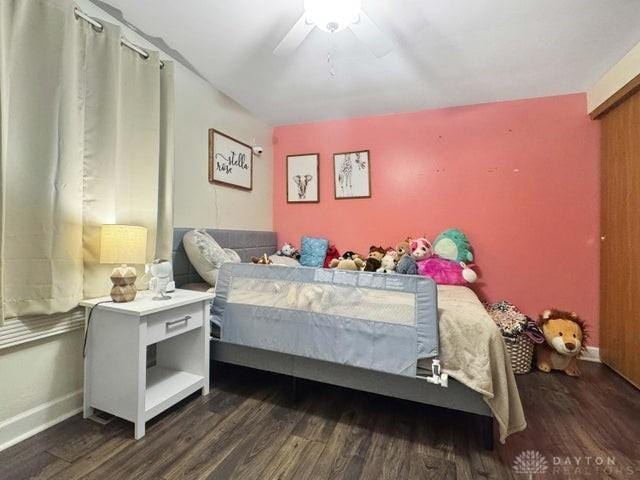1277 Yocom Rd, Cable, OH 43009 - bedroom featuring wood finished floors, a ceiling fan, and baseboards