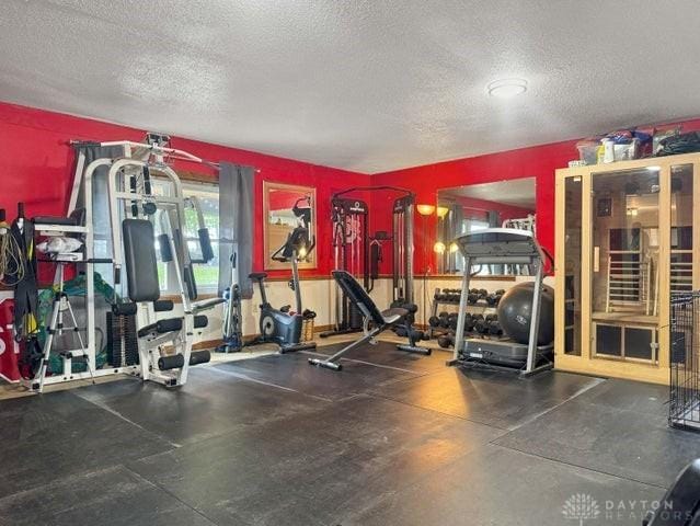 1277 Yocom Rd, Cable, OH 43009 - workout area featuring a textured ceiling