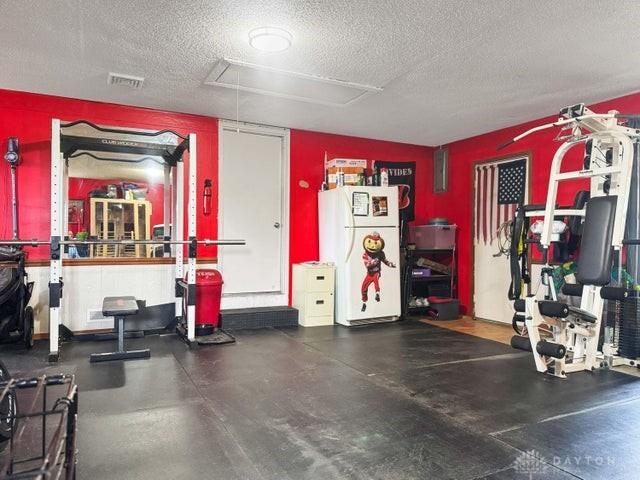 1277 Yocom Rd, Cable, OH 43009 - garage featuring freestanding refrigerator