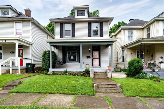 519 Prytania Ave, Hamilton, OH 45013 - american foursquare style home featuring covered porch and a front yard