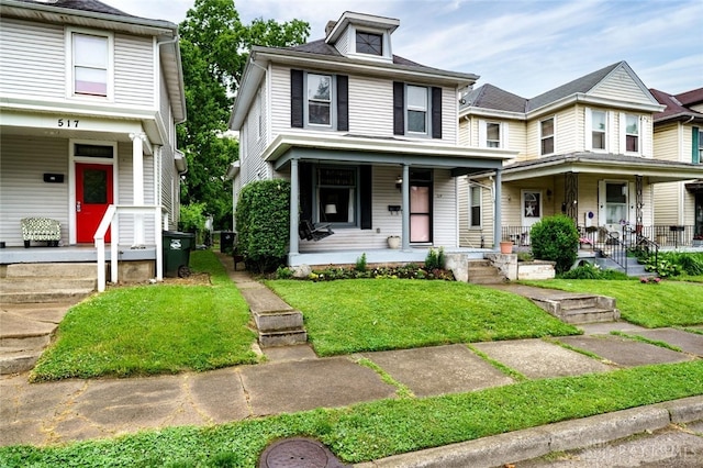 519 Prytania Ave, Hamilton, OH 45013 - american foursquare style home with a porch and a front yard