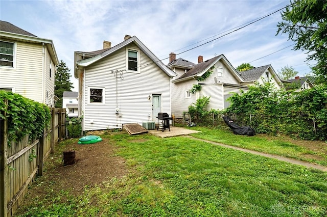 519 Prytania Ave, Hamilton, OH 45013 - back of property featuring a patio and central AC
