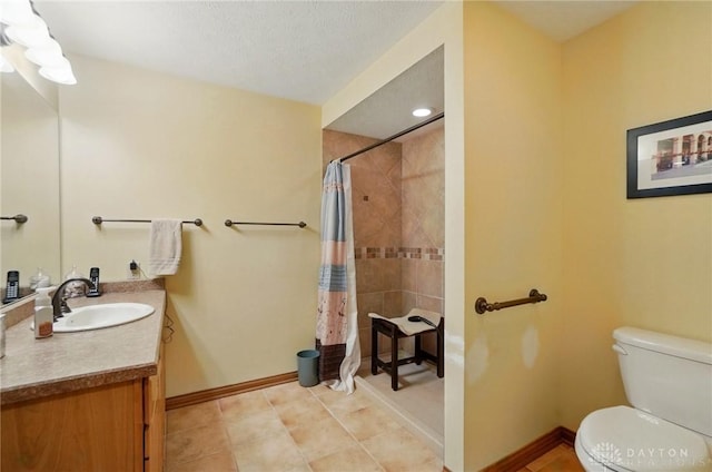 1403 Timshel St, Sugarcreek Township, OH 45440 - full bath featuring toilet, vanity, a tile shower, tile patterned flooring, and baseboards