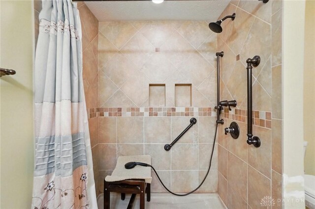 1403 Timshel St, Sugarcreek Township, OH 45440 - full bathroom with a tile shower and toilet
