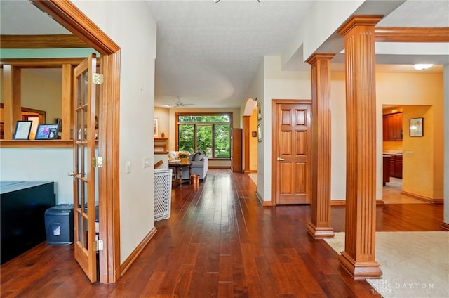 1403 Timshel St, Sugarcreek Township, OH 45440 - corridor with ornate columns, dark wood-style flooring, and baseboards