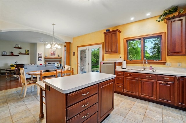 1403 Timshel St, Sugarcreek Township, OH 45440 - kitchen with a sink, light countertops, stainless steel dishwasher, a center island, and open floor plan