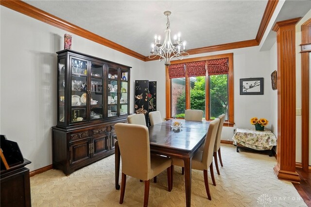 1403 Timshel St, Sugarcreek Township, OH 45440 - dining space featuring a chandelier, ornamental molding, baseboards, and light carpet