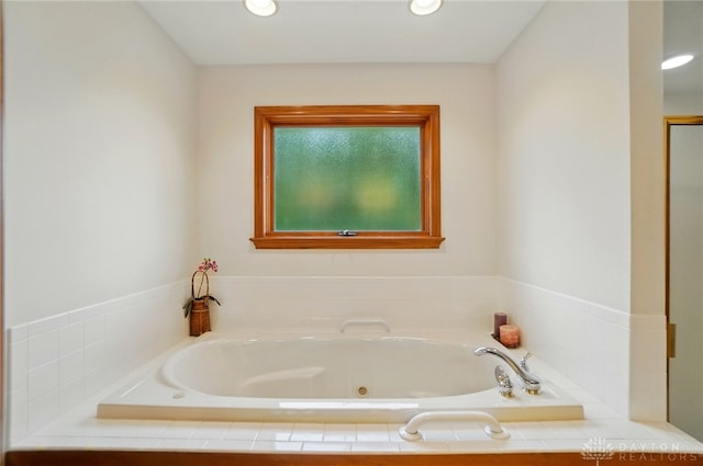 1403 Timshel St, Sugarcreek Township, OH 45440 - bathroom with a jetted tub and recessed lighting