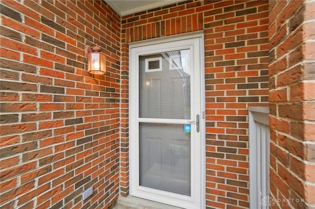 9235 Great Lakes Cir, Washington Twp, OH 45458 - property entrance featuring brick siding