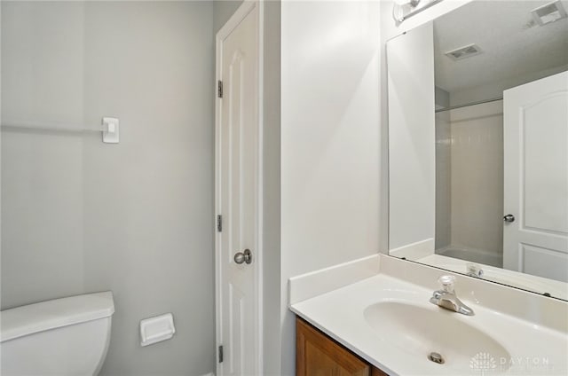 9235 Great Lakes Cir, Washington Twp, OH 45458 - bathroom with vanity, toilet, and a shower
