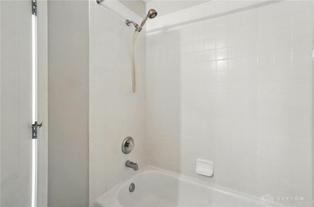 9235 Great Lakes Cir, Washington Twp, OH 45458 - bathroom featuring washtub / shower combination