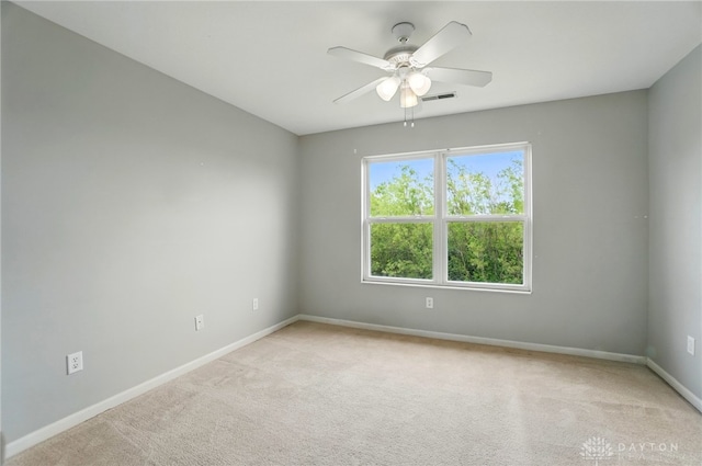 9235 Great Lakes Cir, Washington Twp, OH 45458 - empty room with a ceiling fan, light colored carpet, and baseboards