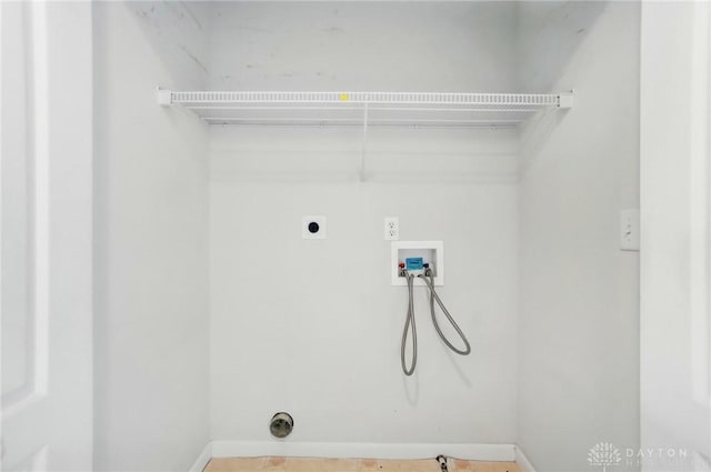 9235 Great Lakes Cir, Washington Twp, OH 45458 - laundry area featuring hookup for an electric dryer, washer hookup, and baseboards