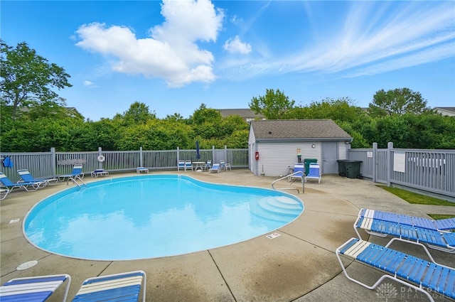 9235 Great Lakes Cir, Washington Twp, OH 45458 - community pool featuring a patio area