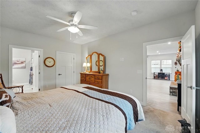 9777 Winding Creek Blvd, Clearcreek Twp, OH 45458 - bedroom with baseboards, light carpet, and a ceiling fan