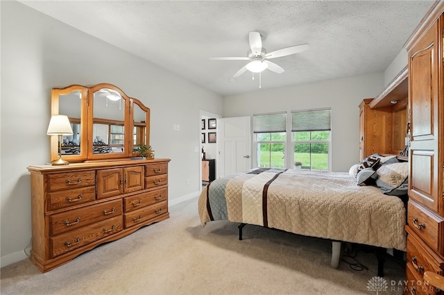 9777 Winding Creek Blvd, Clearcreek Twp, OH 45458 - bedroom with light colored carpet, baseboards, and ceiling fan
