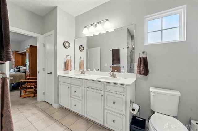 9777 Winding Creek Blvd, Clearcreek Twp, OH 45458 - ensuite bathroom with double vanity, toilet, and tile patterned floors
