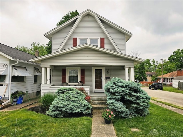 1800 Patterson Rd, Dayton, OH 45420 - view of front of property featuring covered porch and a front yard