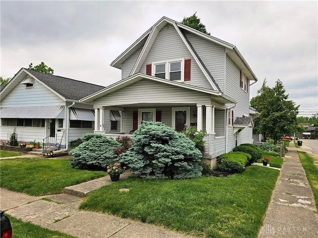 1800 Patterson Rd, Dayton, OH 45420 - colonial inspired home featuring a front lawn and a porch