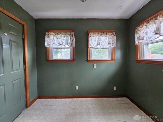 1800 Patterson Rd, Dayton, OH 45420 - spare room featuring plenty of natural light, baseboards, and light flooring