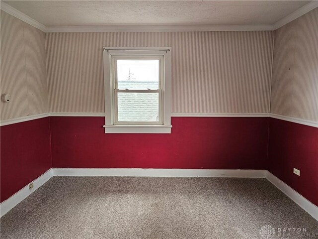 1800 Patterson Rd, Dayton, OH 45420 - carpeted empty room featuring ornamental molding and baseboards