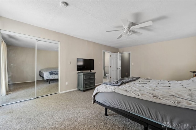 2089 Clearview Dr, Bellbrook, OH 45305 - bedroom with light colored carpet, ceiling fan, a closet, baseboards, and ensuite bathroom