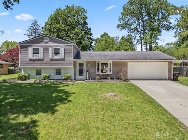 2089 Clearview Dr, Bellbrook, OH 45305 - tri-level home with an attached garage and concrete driveway