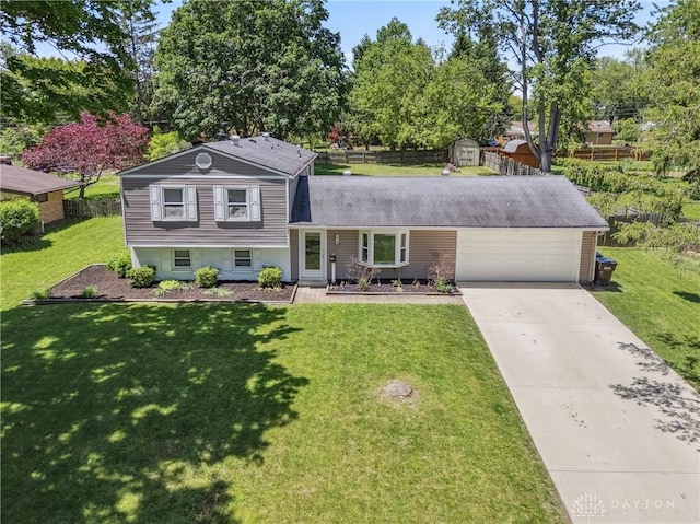 2089 Clearview Dr, Bellbrook, OH 45305 - split level home featuring an attached garage and driveway