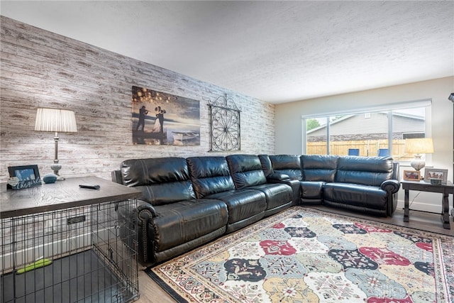 4491 Powder Horn Dr, Beavercreek, OH 45432 - living area featuring wood finished floors and a textured ceiling