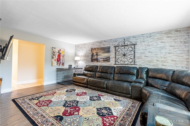 4491 Powder Horn Dr, Beavercreek, OH 45432 - living room with an accent wall, wood finished floors, and baseboards
