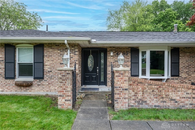 4491 Powder Horn Dr, Beavercreek, OH 45432 - entrance to property with brick siding and roof with shingles
