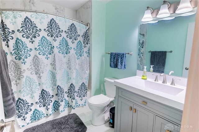 4491 Powder Horn Dr, Beavercreek, OH 45432 - bathroom with vanity, toilet, and shower / bath combo with shower curtain