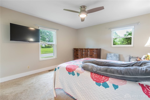 4491 Powder Horn Dr, Beavercreek, OH 45432 - carpeted bedroom featuring baseboards and ceiling fan