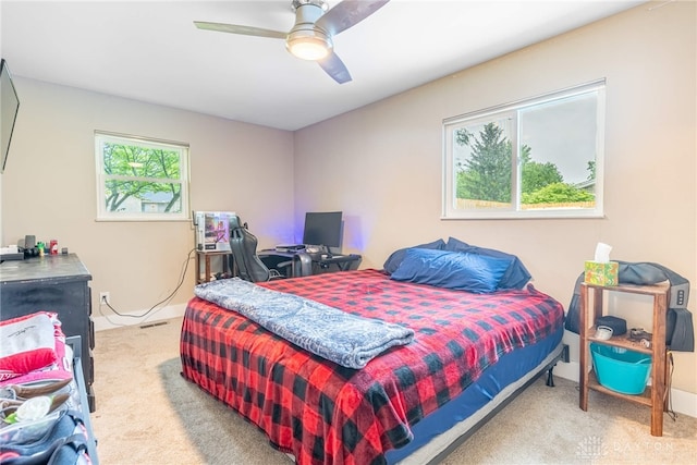 4491 Powder Horn Dr, Beavercreek, OH 45432 - carpeted bedroom featuring a ceiling fan and baseboards