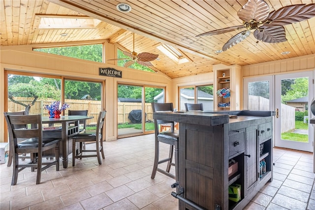 4491 Powder Horn Dr, Beavercreek, OH 45432 - sunroom / solarium featuring a skylight, lofted ceiling, and healthy amount of natural light
