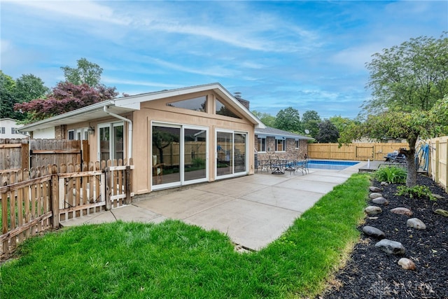4491 Powder Horn Dr, Beavercreek, OH 45432 - back of property with a fenced backyard and a patio area