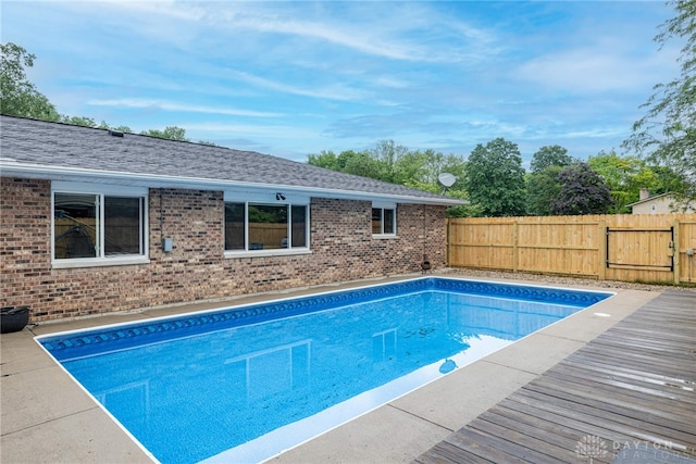 4491 Powder Horn Dr, Beavercreek, OH 45432 - view of pool featuring a wooden deck and a gate