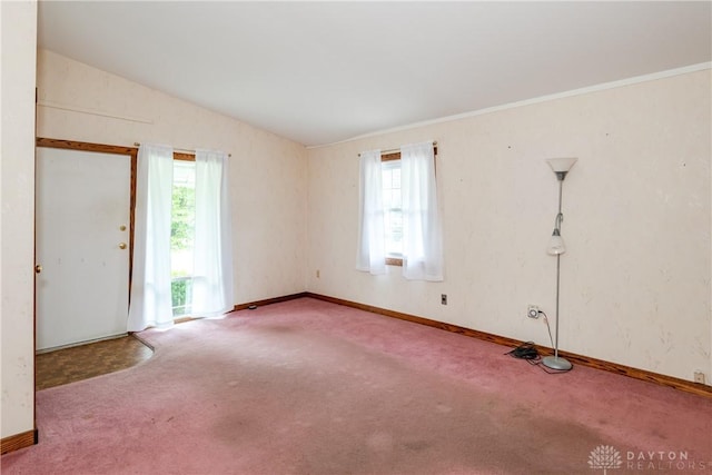 903 Kennison Ave, New Carlisle, OH 45344 - spare room featuring plenty of natural light, carpet flooring, baseboards, and vaulted ceiling