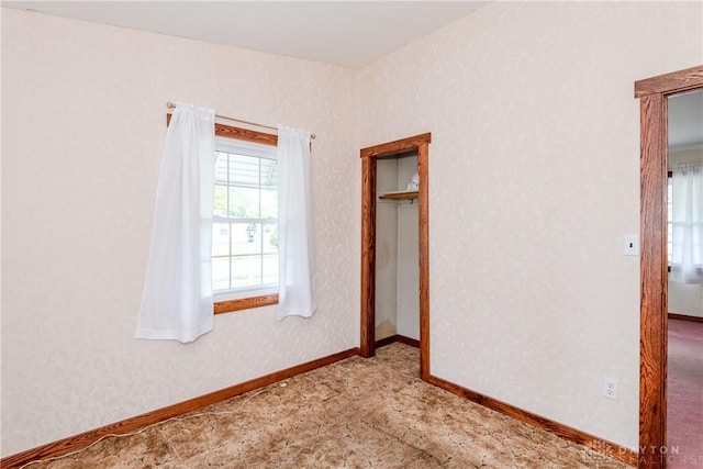 903 Kennison Ave, New Carlisle, OH 45344 - unfurnished bedroom with carpet flooring and baseboards